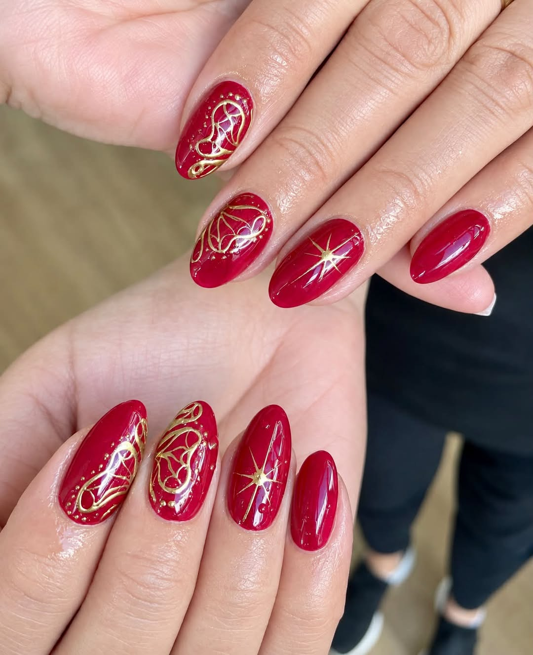 Red and gold bespoke nails by Funky Nails